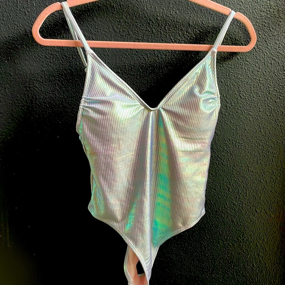 One piece swim suit. Silver/holographic. Tried on; never worn out.